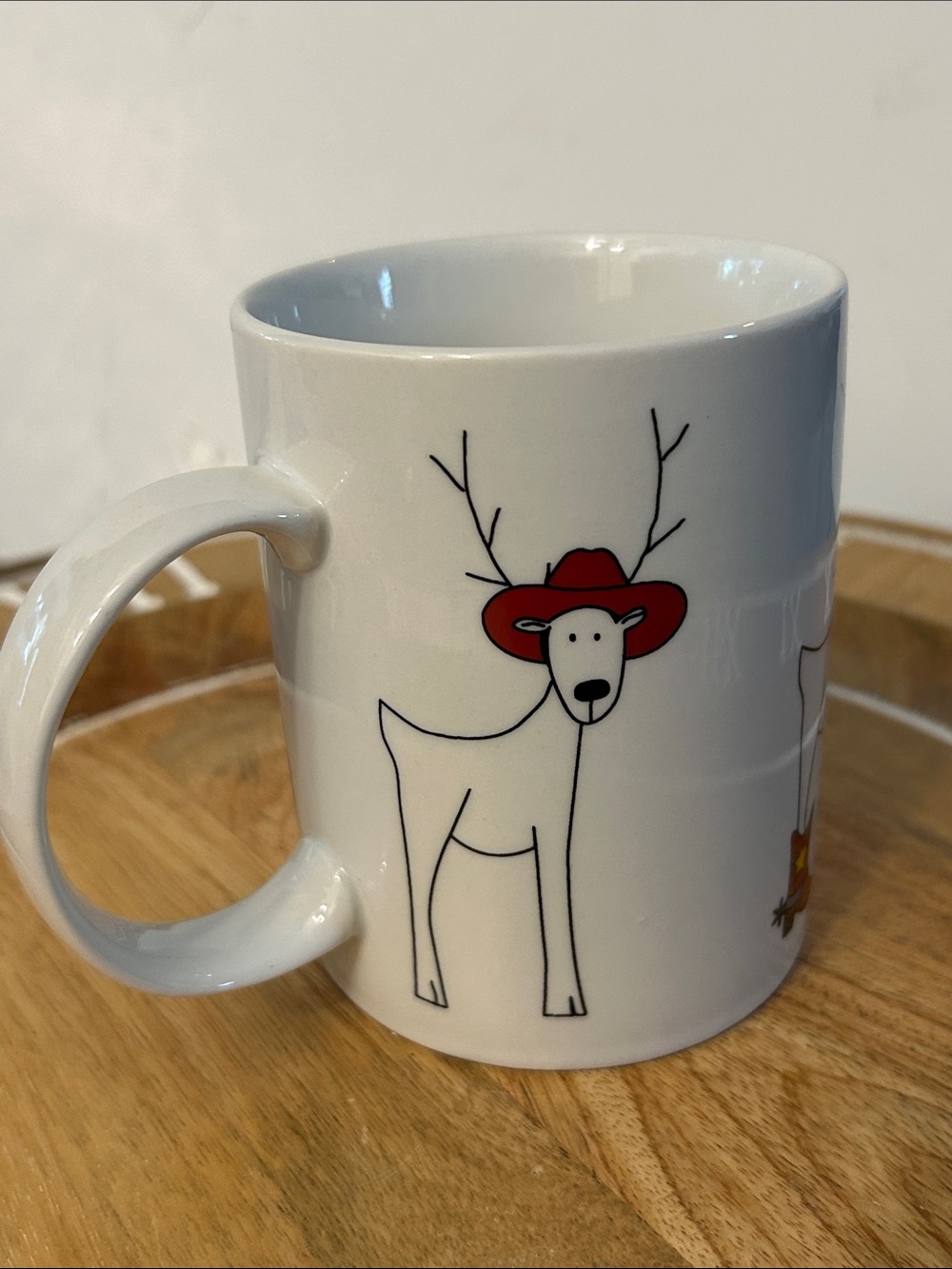 Cordon Bleu Holiday Reindeer Ceramic Mug reindeers in cowboy boots, hat, lasso